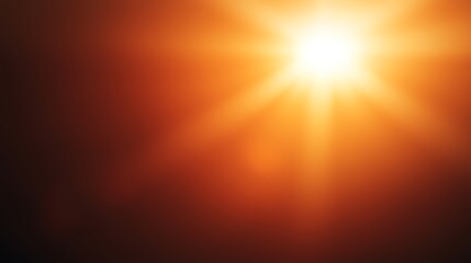 Obraz premium A bright sun radiates intense orange light and warm rays across a blurred sky.