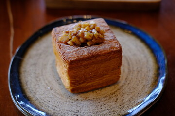Square Croissant with Apple Jam on Top, Served on a Stylish Plate