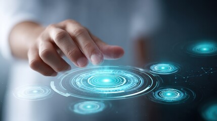 A hand interacts with a futuristic digital touchscreen interface featuring glowing blue circular graphics.