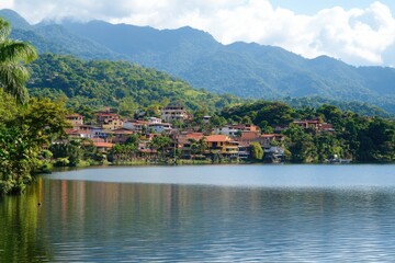 Fototapeta premium Lake town with mountains view on a white background