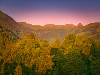 Sunrise in a mountains near Saalbach Hinterglemm Leogang ski resort during summer morning