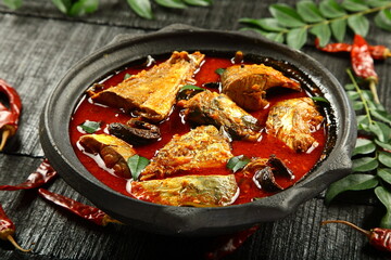 Kerala spicy fish curry - cooked in clay pottery.