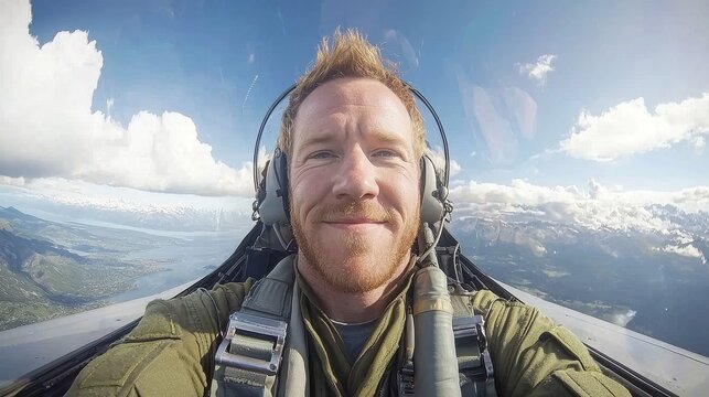 A confident pilot captures a joyful selfie while soaring through the sky in a jet, showcasing the thrill of flying and the beauty of the surrounding clouds.