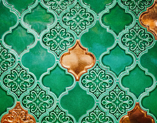 Green Tiles Background. Top view of beautiful luxury vintage green and gold tiles, islamic style backdrop pattern background.