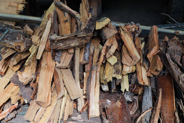 Dry Firewood Logs Stacked Neatly for Cooking or Heating Purpose