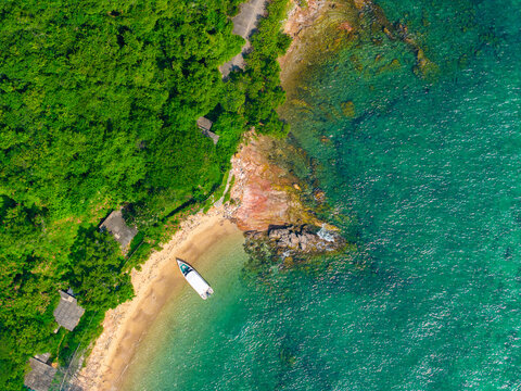 Travel landscape of paradise Thai beach with boat. Beautiful island Koh Sak, Pattaya Thailand, aerial view from drone