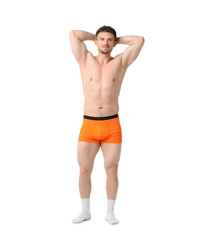 Fototapeta premium Young man in stylish orange underwear on white background