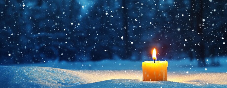 single candle burning brightly in the snow, casting warm light against a dark blue background with falling snowflakes, wallpaper for New Year's Day or holiday cards, Christmas night, wide banner 