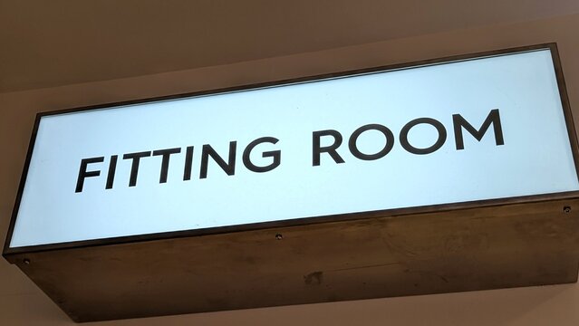 Fitting room sign in modern bold white and black for changing room at clothes shop