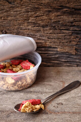Granola and strawberry dried fruits on box