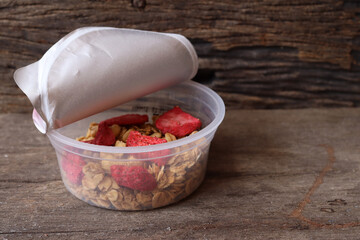 Granola and strawberry dried fruits on box