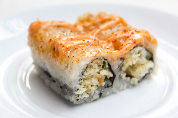 close up of sushi on a plate