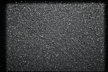 Black and white image of a snowy city square