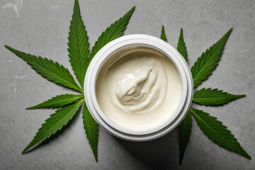 A cream container sitting on a table with a white background, ideal for food or product photography