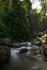 Obraz premium Natural Beauty of Tropical Green Forests with Mountains and Waterfalls in Indonesia