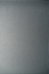 Brushed metal texture background with smooth lines and grey metallic surface