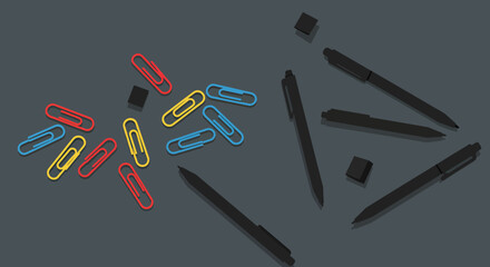 Colorful Paperclips And Pens On Dark Gray Background