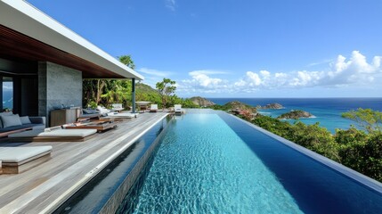 Fototapeta premium Luxurious infinity pool overlooking the ocean. Tranquil, modern home with panoramic views