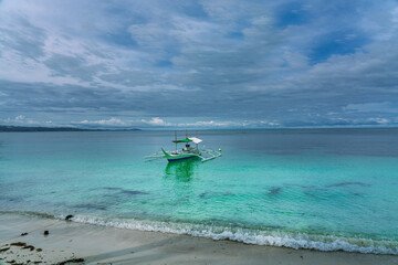 sea, sun and sand. White sand beach with blue water, white sand and palm trees. Summer vacation vibes. Beaches in asia.
