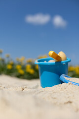 bucket and spade on beach