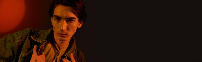 Young fashionable non binary person confidently embracing their unique identity