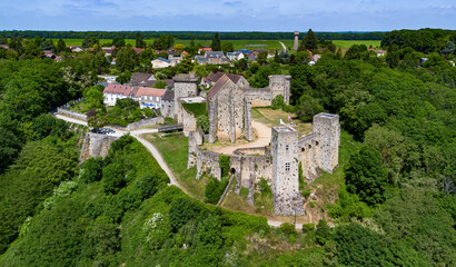 Aerial view of the Château de la Madeleine (Madeleine Castle) overlooking the village of Chevreuse...