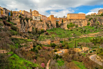 Cuenca, Castile La Mancha, Spain. Houses hanging on a cliff edge in the old town of Cuenca. Travel...