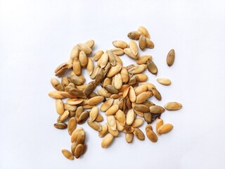 melon seeds isolated on white background. top view