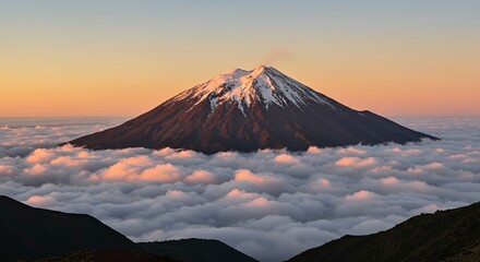 Mountain Peak Above Clouds at Sunset