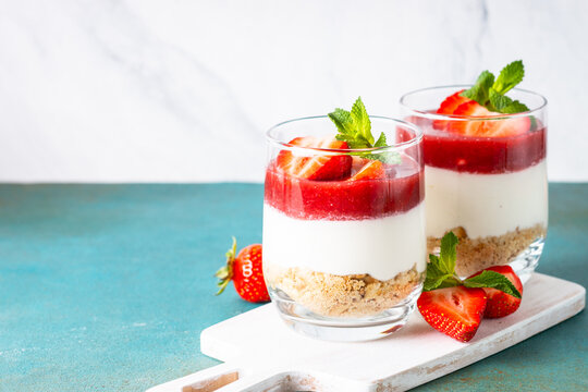 Strawberry cheesecake in glass, no baking dessert.