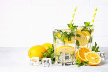 Lemonade in glass on white table.