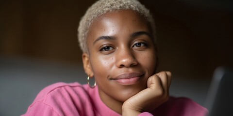 Portrait of a student with buzzcut in thoughtful expression