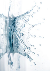 Side view of splashing water in circle shape isolated on white background and generated with AI
