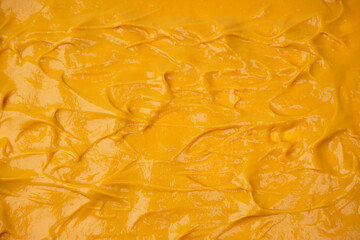 Yellow sauce splashes as a background.