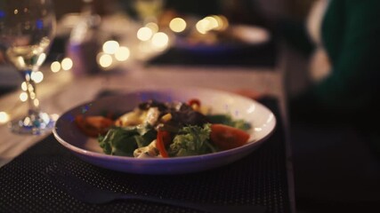 Fine Dining Service: Elegant Senegalese Waiter Serving Gourmet Steak Dish to Happy Customers, Beautifully Plated Dinner in Upscale Restaurant
