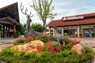 Monument in Luhuitou Park. The park deer turned its head, May 16, 2024, Sanya, Hainan, China.