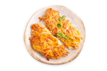 baked chicken meat with cheese and tomatoes isolated on white. top view, flat lay, close up