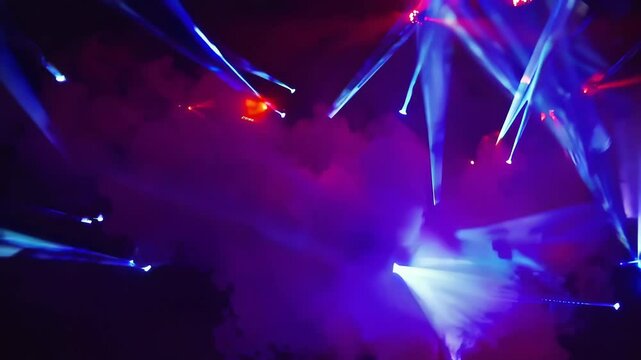 Vibrant stage lights with purple and blue smoke, featuring flashing red and blue neon laser rays. Abstract 3D animation perfect for festive concerts, club visuals, and dynamic music hall backgrounds.