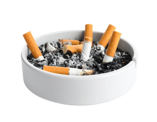 A white ashtray filled with cigarette butts and ashes.