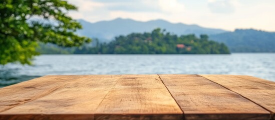 Rustic wooden platform overlooking serene waters and misty mountain landscape