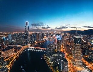 a breathtaking aerial view of a city s illuminated skyline and river showcasing modern architecture and bustling streets at night