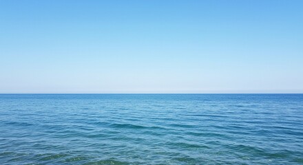 Obraz premium Serene Ocean Horizon A Stunning View of Calm Blue Waters Under a Clear Sky