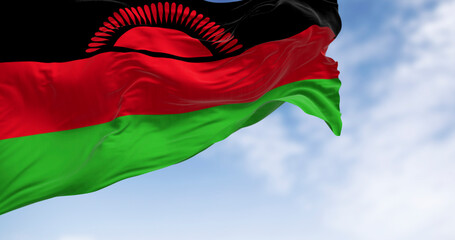Close-up of Malawi national flag waving in the wind on a clear day