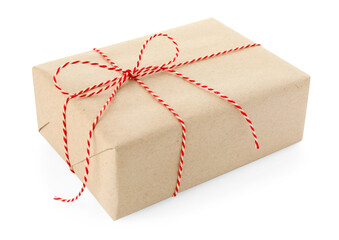 Gift wrapped in kraft paper with bow isolated on white