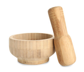 Wooden mortar with pestle isolated on white