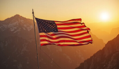 Obraz premium American Flag Waving Proudly at Sunset atop Rocky Mountains – Patriotic USA Landscape Photography
