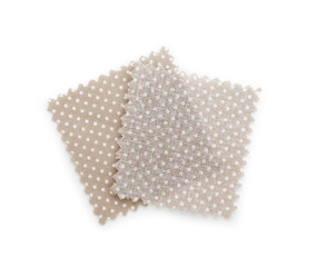 Samples of fabrics with polka dot pattern isolated on white, top view