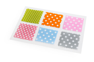 Samples of fabrics with polka dot pattern isolated on white