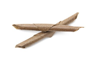 Delicious fruit leather rolls on white background, top view