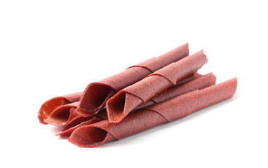 Delicious fruit leather rolls on white background